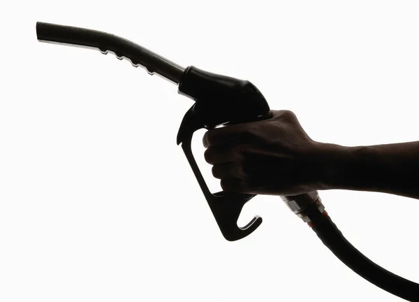 Hand Holding Petrol Pump Silhouettte White Background — Stok Foto