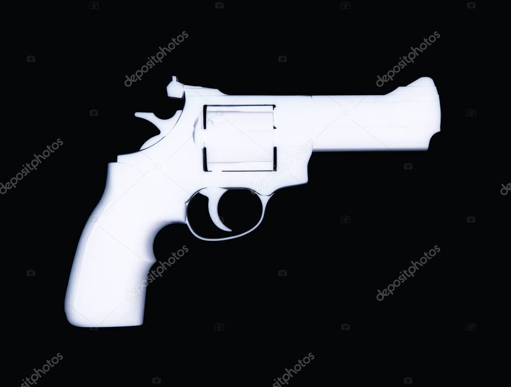 X-RAY IMAGE OF REVOLVER ON BLACK BACKGROUND
