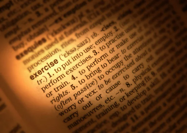 Κοντινό Πλάνο Του Λεξικό Σελίδα Προβολή Ορισμός Της Άσκησης Λέξη — Φωτογραφία Αρχείου