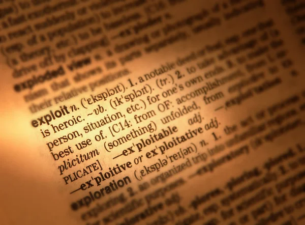 Close Dictionary Page Showing Definition Word Exploit — Stock Photo, Image