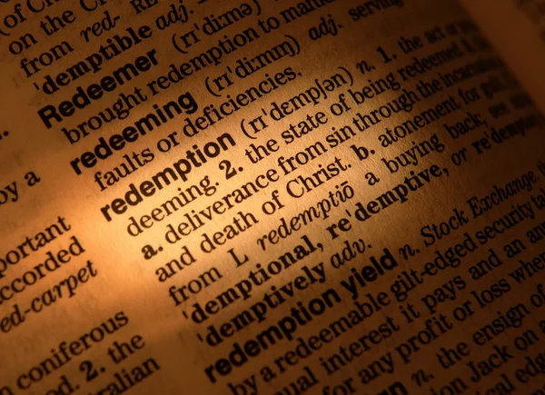 Close Dictionary Page Showing Definition Word Redemption — Stock Photo, Image