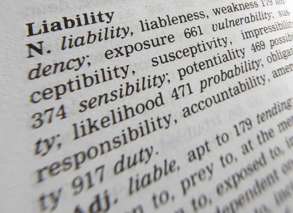 Synonym ordboks sida som visar definition av ord ansvar Stockbild