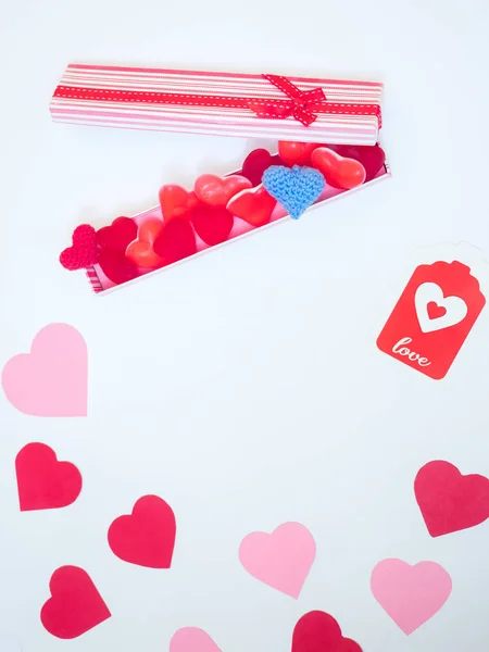 San Valentine day decoration card made with red and pink paper hearts. Gift card.