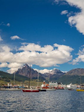 Ushuaia from the sea with ships and mountains, Patagonia in Argentina. Mount Oliva in the back clipart