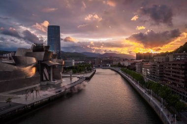 1/MAY/2019 BILBAO SPAIN; Bilbao riverside near Guggenheim Museum during the sunset clipart