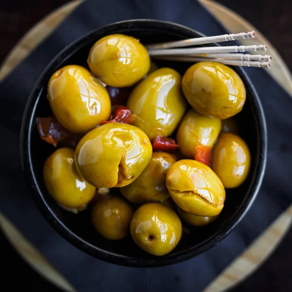 Olives vertes épicées tapa espagnol Photo De Stock