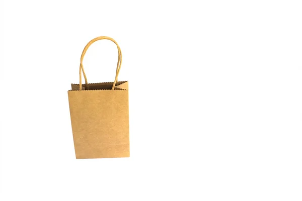 Bolsa de compras de papel marrón con manos aisladas sobre fondo blanco —  Fotos de Stock