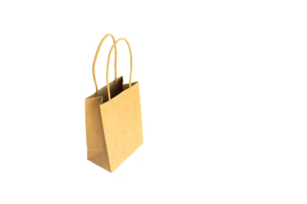 Opend brown paper shopping bag with hands isolated on white back — Stock Photo, Image