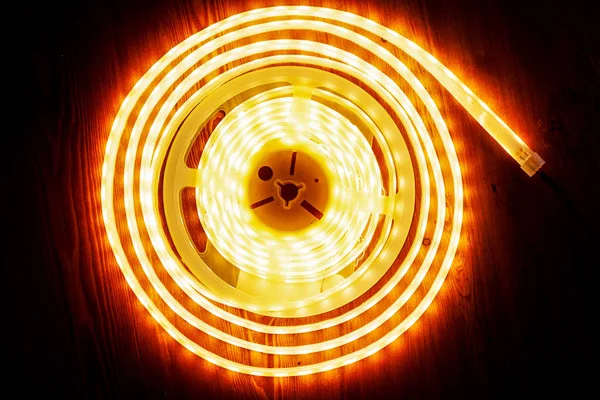 beautiful glowing LED strip of warm light for mounting decorative lighting for homes, offices and other dark places