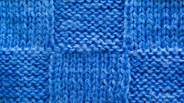 Blue background of knitted yarn, texture pattern knitted fabric — Stock Photo, Image