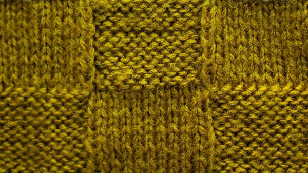 Brown-green background of knitted yarn, texture pattern knitted fabric — Stock Photo, Image