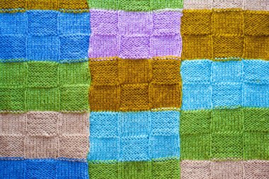 örme kapak çok renkli parçaların doku, renkli ipliklerin arka plan 