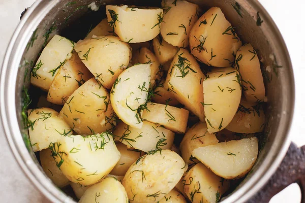 Boiled potatoes with dill and butter in a pan — Stock Photo, Image