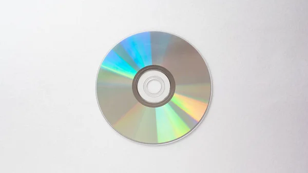 CD на светло-сером фоне — стоковое фото