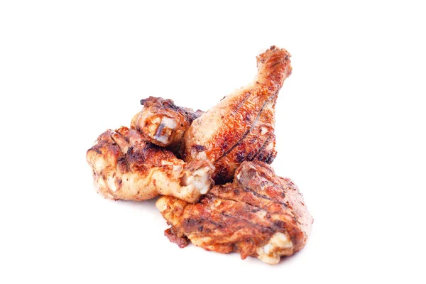 Gambe di pollo grigliate isolate su uno sfondo bianco — Foto Stock