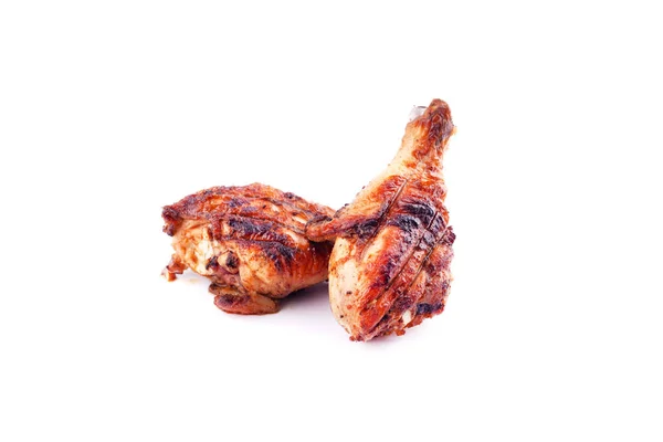 Gambe di pollo arrosto isolate su uno sfondo bianco — Foto Stock