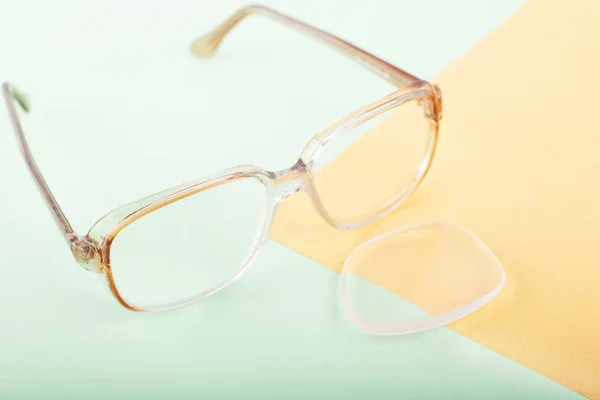 replacement of lenses to improve vision, loss of glass from the spectacle frame,broken reading glasses