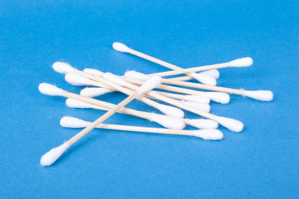 Cotton buds for cleaning auricles on blue background — Stock Photo, Image