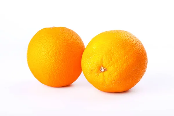 2 pomarańcze cytrusowe na białym tle zbliżenie. — Zdjęcie stockowe