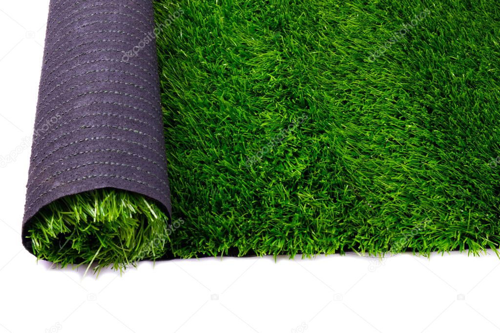 artificial green lawn, floor covering, artificial grass roll isolated on white background