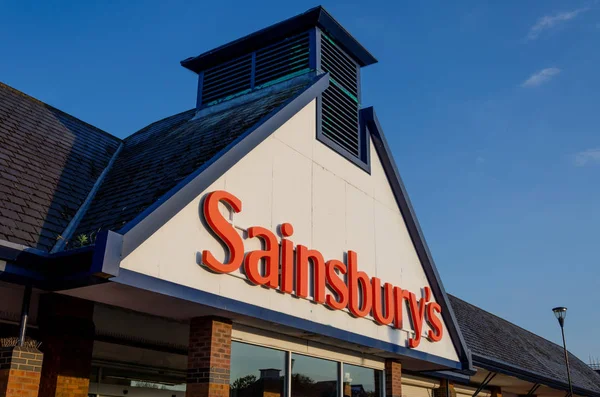 Flint, İngiltere: 22 Mayıs 2018: Flint deposunda Sainsbury's. Asda ile birleştirilmesi sürecinde olan Sainsbury's onların personel son zamanlarda yeniden ve notlar ödemek.