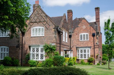 Port Sunlight, İngiltere: 6 Haziran 2018: bitişik kolu Bros sabun fabrikasının işçileri ev inşa bir model köy. Mimar styling özetin özeti İngilizce olarak tasarlanmış tek tek her evim.