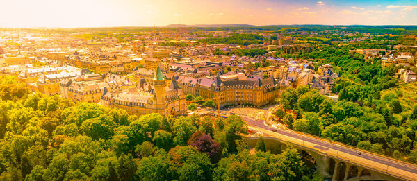 Panoramic aerial view of Adolph bridge, Fort Burbon and Musee de la banque in Luxembourg on a beautiful summer day, Luxembourg