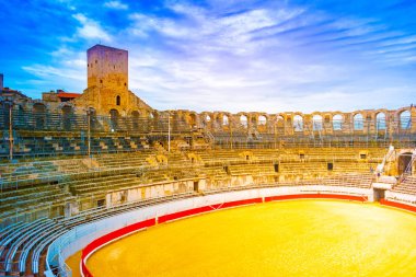 Arena and roman amphitheatre in Arles, France clipart