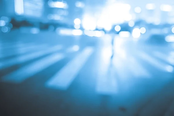 Abstract background of People across the crosswalk at night in Shanghai, China. — Stock Photo, Image