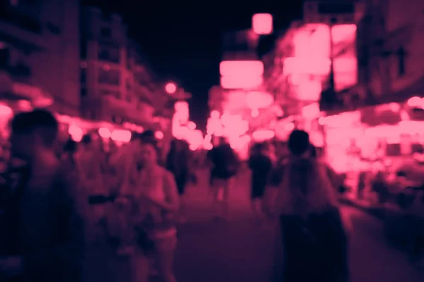 Blurred image of busy night life in the city. — Stock Photo, Image