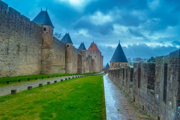 Castle of Carcassonne, France. Medieval Carcassone town view, France. Gloomy castle rain. — Stock Photo, Image