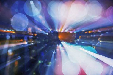 Arka plan resim dairesel bokeh hareket şehir, trafik ışığı gece zaman sokakta araba sokak ışık arka plan bulanık. Etkisi zoom.