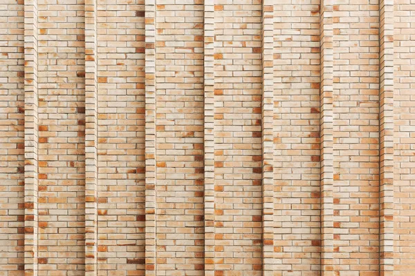 建物に飾られた茶色のレンガの壁からの抽象的な背景. — ストック写真