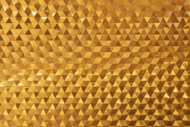 Duvara süslenmiş altın tuğladan soyut arka plan. Modern 