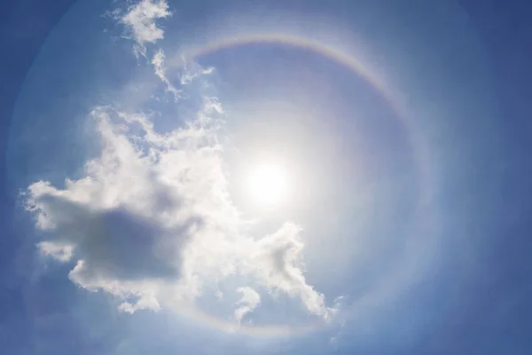 Sun halo in blue sky with cloud. Dream, miracle and amazing natu