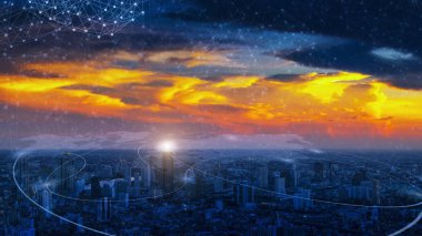Dünya haritası ile bağlantı hattı simgesi ile gün doğumunda Cityscape