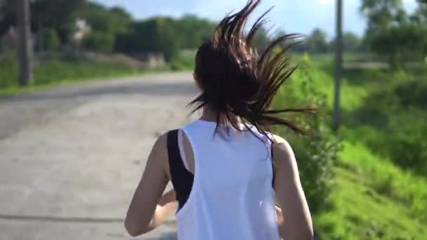 Giovane Bella Donna Asiatica Jogging Nel Parco — Video Stock