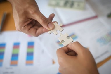 Yap-boz, iş ortaklığı kavramı tutan el.