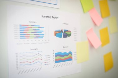 Close-up hand present business graph chart on whiteboard. planning concept.