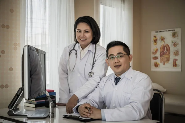 Group Doctors Looking Computer Meeting Hospital Ward Royalty Free Stock Images