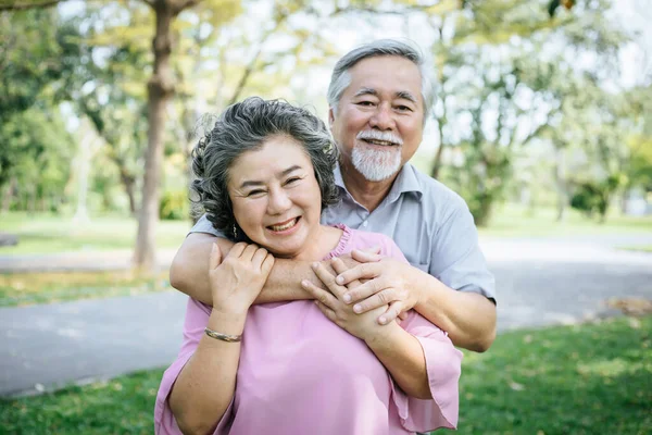 Happy senior couple in the park