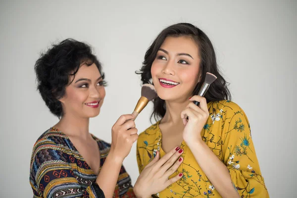 Two Young Beautiful Woman Touch Powder Brush White Background — Stock Photo, Image