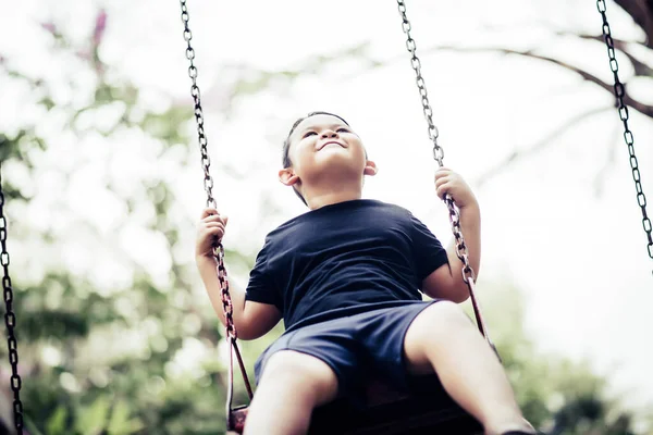 Adorable Little Boy Having Fun Swing Outdoor — Stock Photo, Image