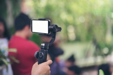 Akıllı telefon kayıt videosuyla el ele tutuşmak