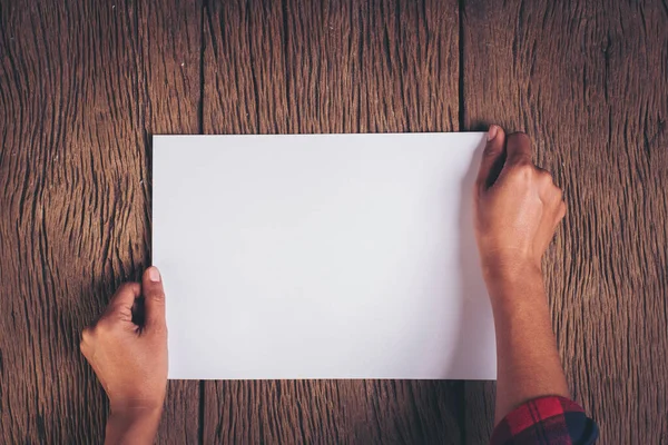 Top View Hand Blank White Paper — Stock Photo, Image