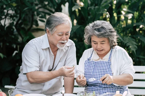 Elderly couples Cooking Healthy food together