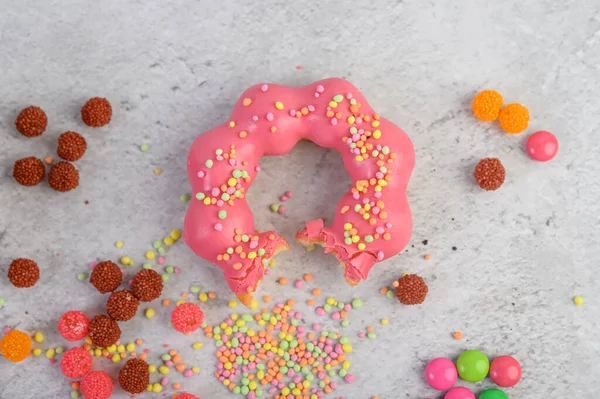 Bitten Strawberry Donut Decorated Icing Sprinkling Floor — Stock Photo, Image