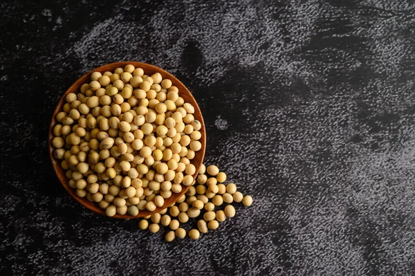 Yellow Beans Wooden Bowl Black Cement Floor Top View — Stock Photo, Image