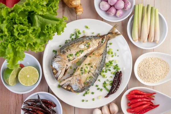 Two Cooked Mackerel Placed White Dish Sprinkled Spring Onions — Stock Photo, Image