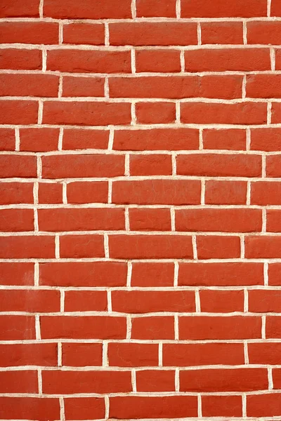 The wall texture is red brick. Background — Stock Photo, Image